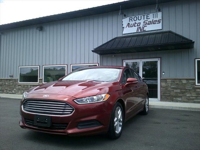 used 2014 Ford Fusion car, priced at $6,995