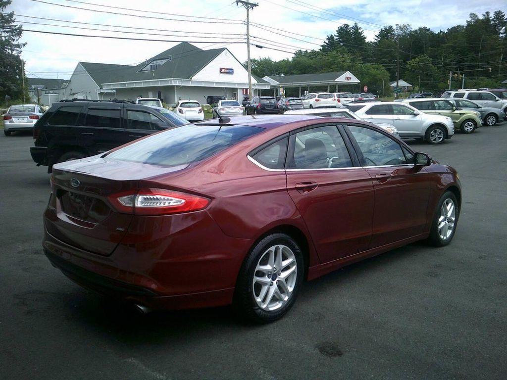 used 2014 Ford Fusion car, priced at $6,995