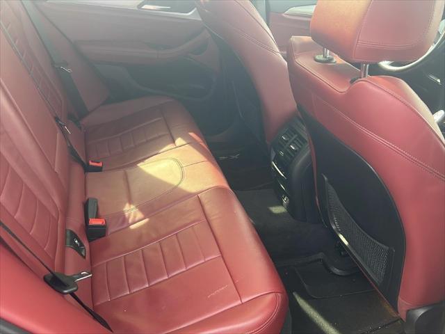 used 2021 BMW X4 car, priced at $30,900