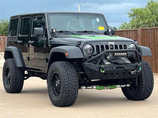used 2011 Jeep Wrangler Unlimited car, priced at $16,595