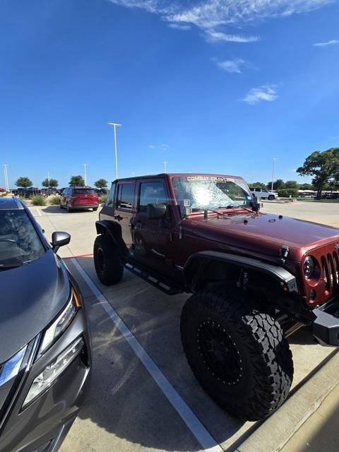 used 2009 Jeep Wrangler Unlimited car, priced at $10,989