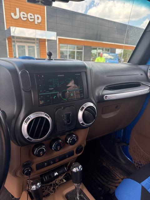 used 2015 Jeep Wrangler car, priced at $16,910