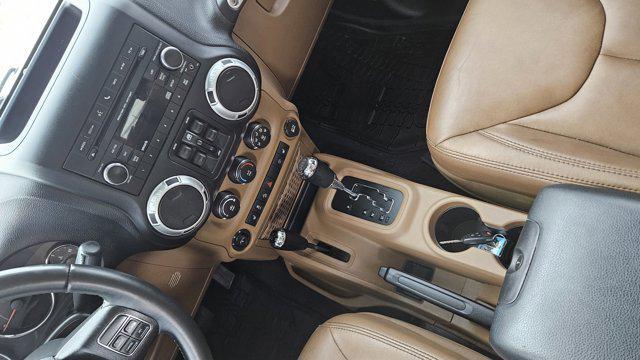 used 2015 Jeep Wrangler Unlimited car, priced at $21,995