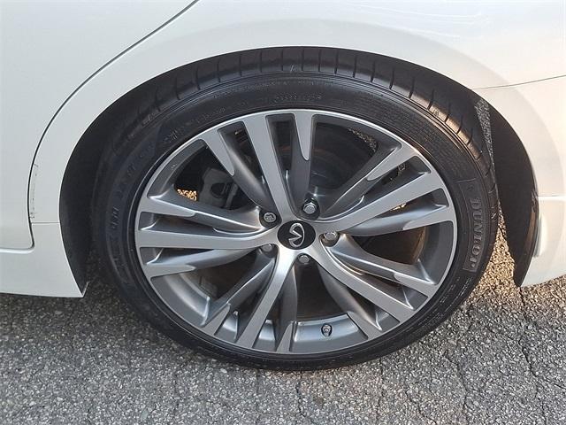 used 2021 INFINITI QX50 car, priced at $27,988
