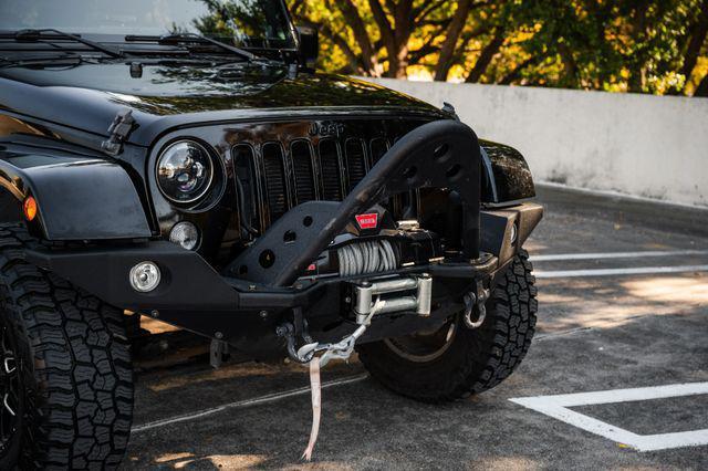 used 2014 Jeep Wrangler Unlimited car, priced at $22,995