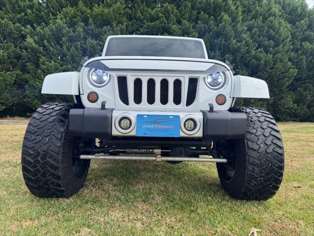 used 2014 Jeep Wrangler Unlimited car, priced at $21,700