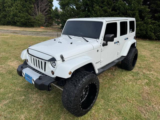 used 2014 Jeep Wrangler Unlimited car, priced at $21,700