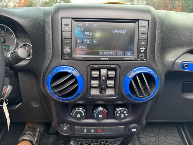 used 2014 Jeep Wrangler Unlimited car, priced at $21,700