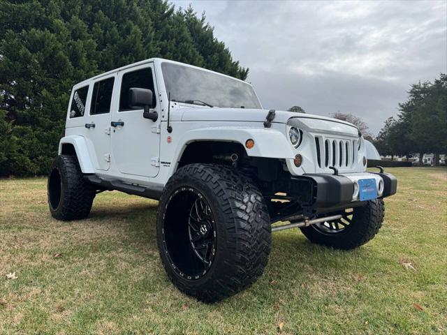 used 2014 Jeep Wrangler Unlimited car, priced at $21,700