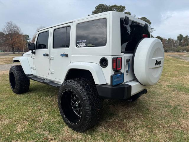 used 2014 Jeep Wrangler Unlimited car, priced at $21,700