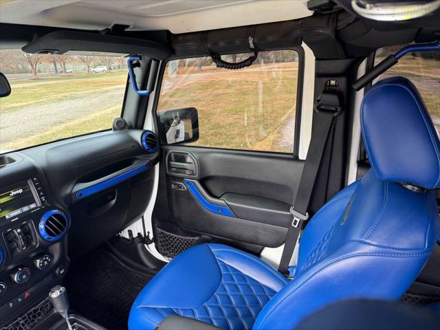 used 2014 Jeep Wrangler Unlimited car, priced at $21,700