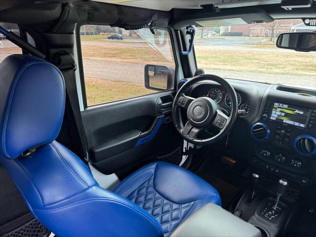 used 2014 Jeep Wrangler Unlimited car, priced at $21,700