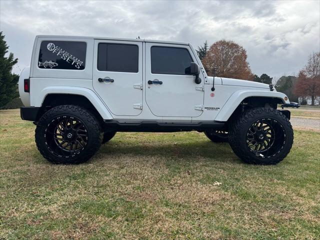 used 2014 Jeep Wrangler Unlimited car, priced at $21,700