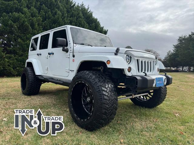 used 2014 Jeep Wrangler Unlimited car, priced at $21,700