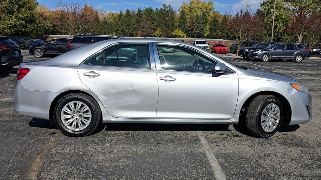 used 2014 Toyota Camry car, priced at $6,990