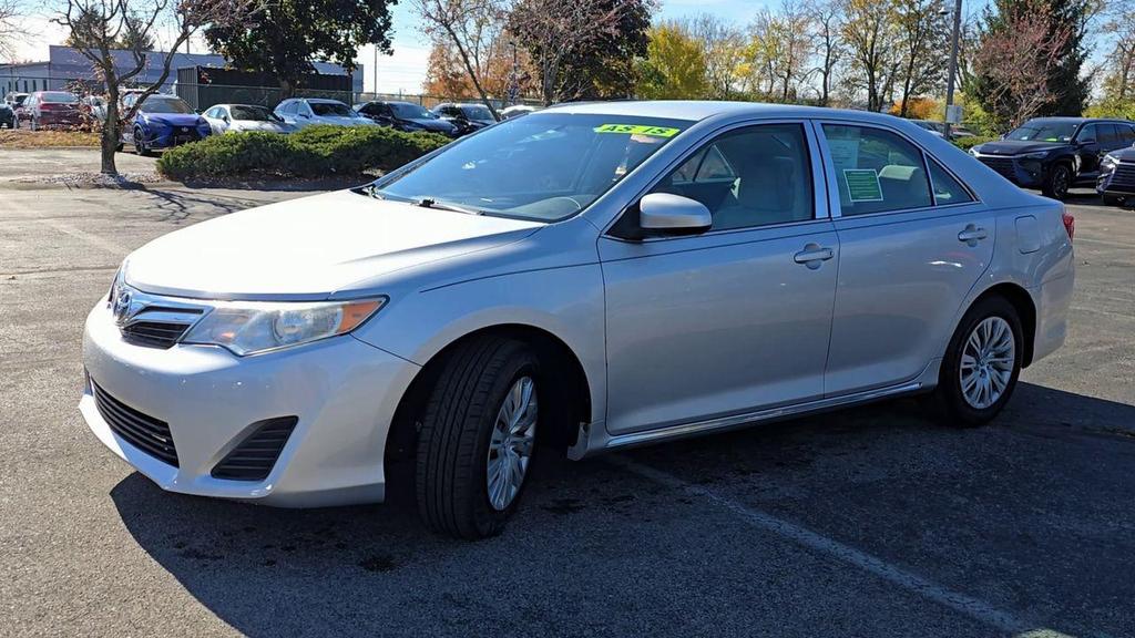used 2014 Toyota Camry car, priced at $6,990