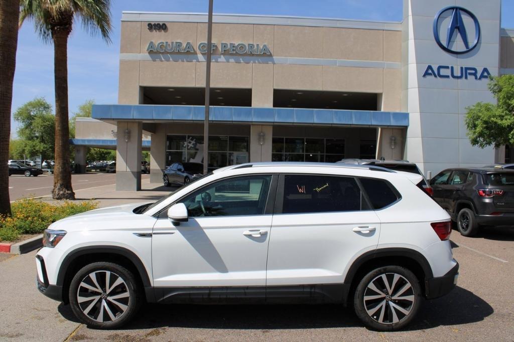 used 2023 Volkswagen Taos car, priced at $22,399