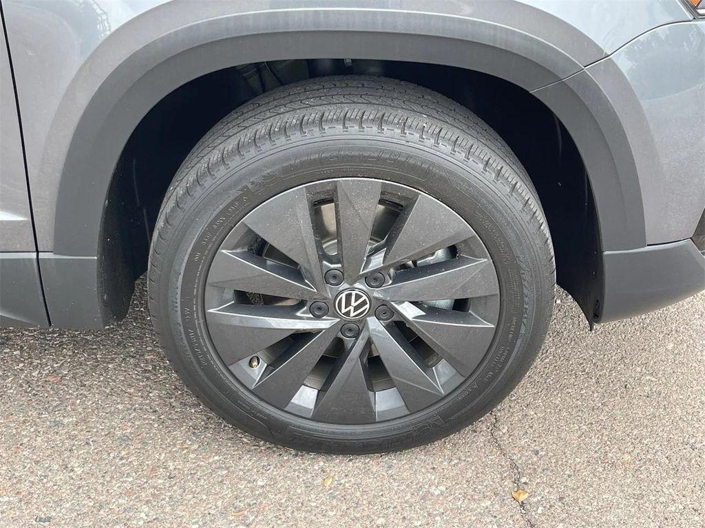 used 2023 Volkswagen Taos car, priced at $15,997