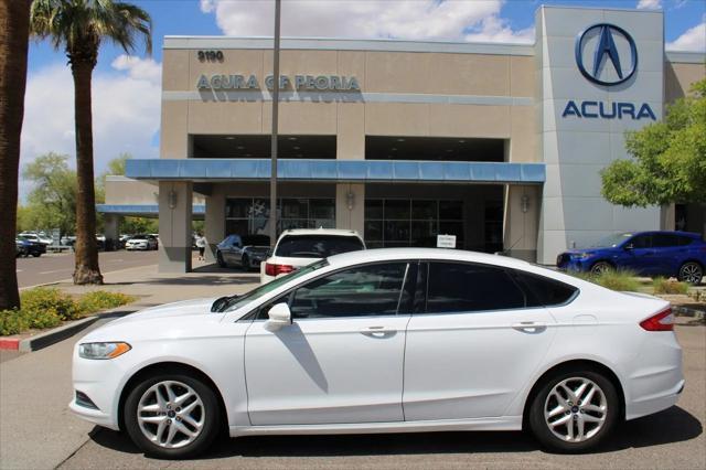 used 2015 Ford Fusion car, priced at $6,999