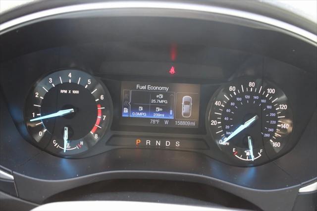 used 2015 Ford Fusion car, priced at $6,999