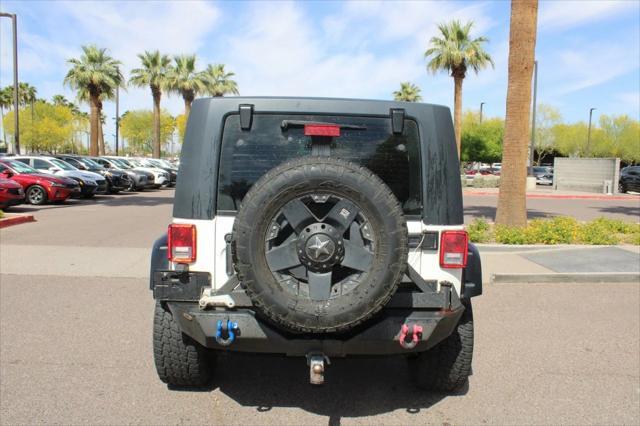 used 2009 Jeep Wrangler Unlimited car, priced at $11,555