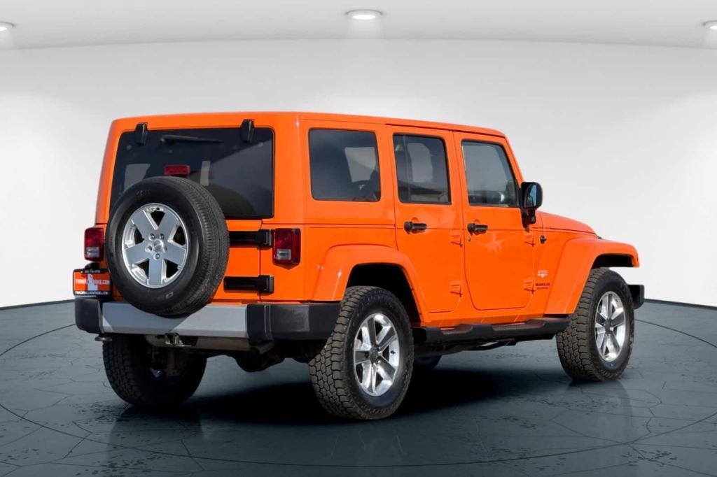 used 2012 Jeep Wrangler Unlimited car, priced at $15,997