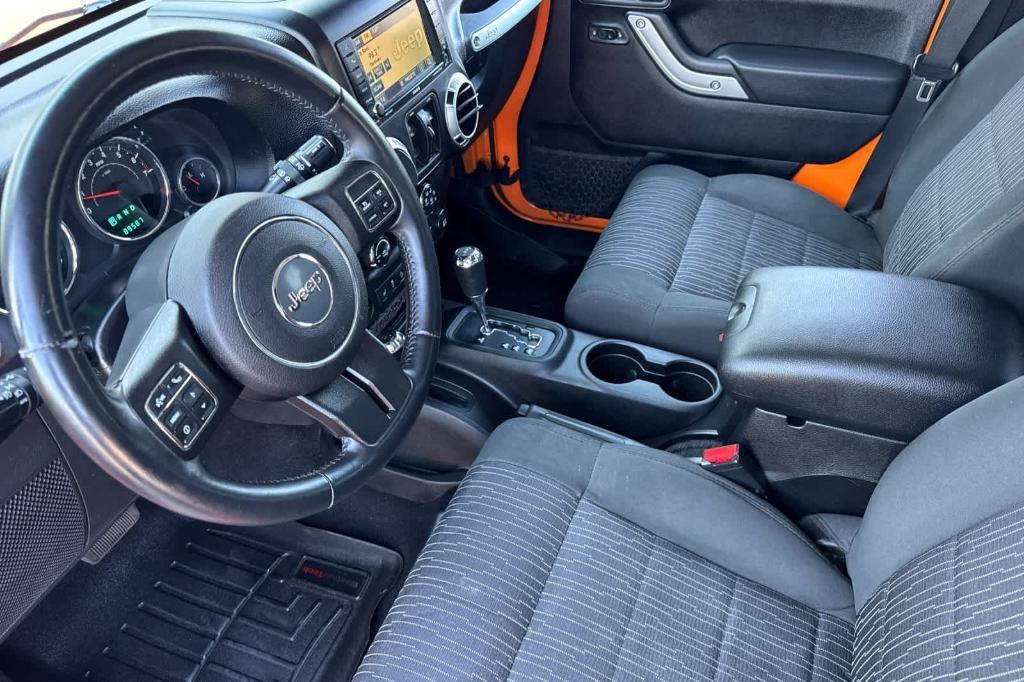 used 2012 Jeep Wrangler Unlimited car, priced at $15,997