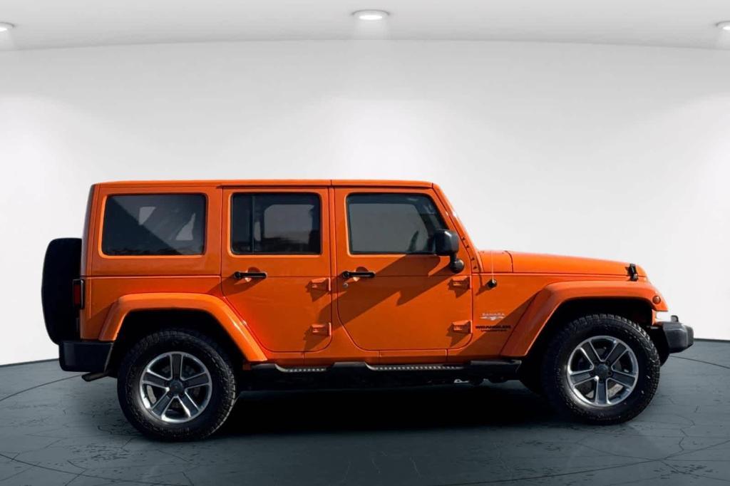 used 2012 Jeep Wrangler Unlimited car, priced at $15,997