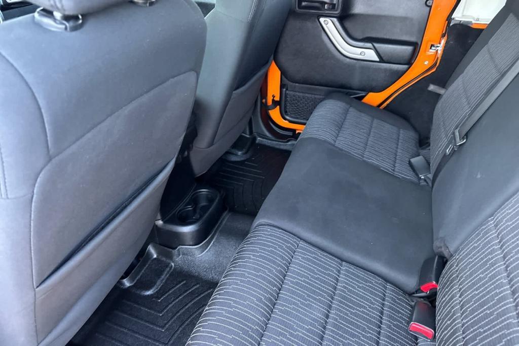 used 2012 Jeep Wrangler Unlimited car, priced at $15,997