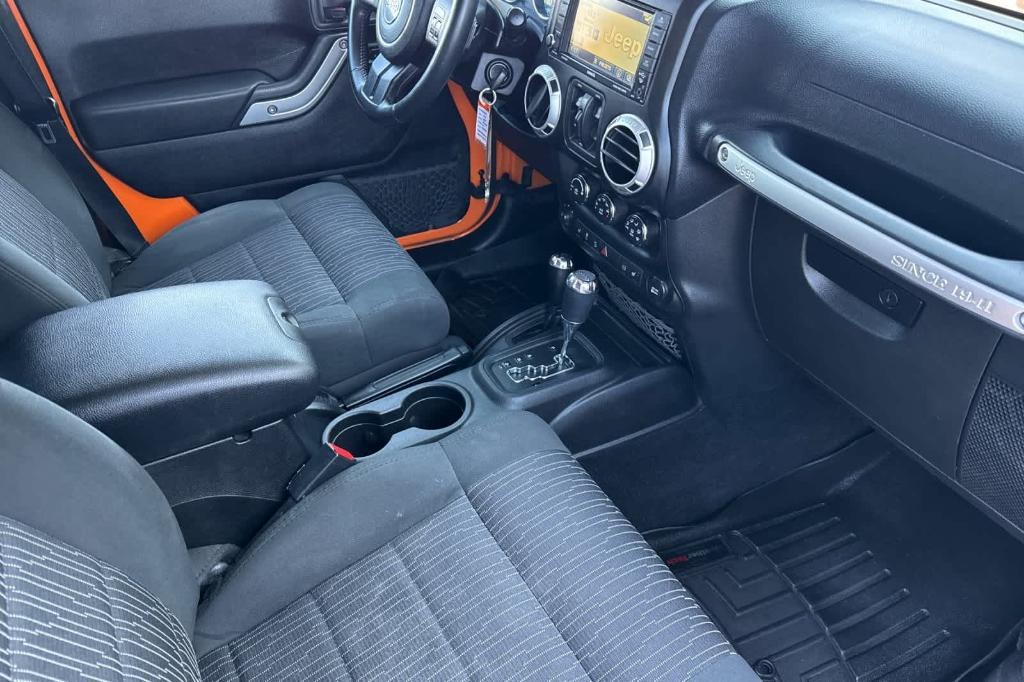 used 2012 Jeep Wrangler Unlimited car, priced at $15,997