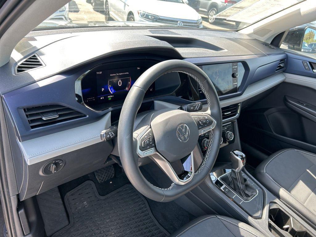 used 2023 Volkswagen Taos car, priced at $19,557