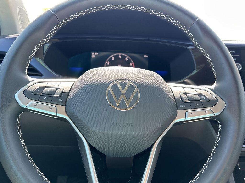 used 2023 Volkswagen Taos car, priced at $19,557