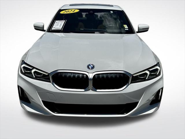 used 2024 BMW 330e car, priced at $30,595