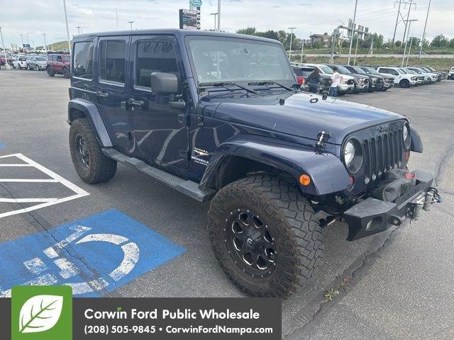 used 2013 Jeep Wrangler Unlimited car, priced at $18,889