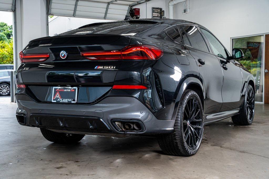used 2023 BMW X6 car, priced at $65,999
