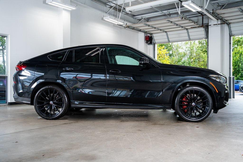 used 2023 BMW X6 car, priced at $65,999