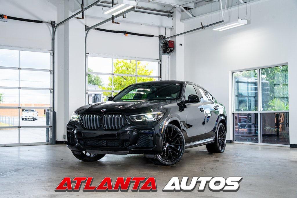 used 2023 BMW X6 car, priced at $65,999