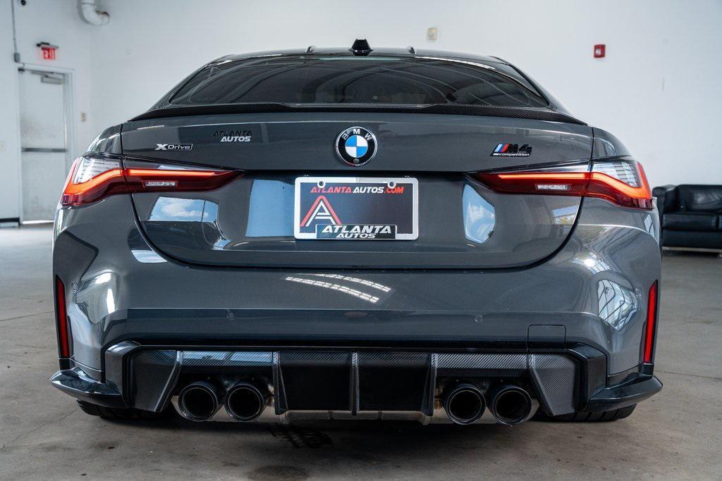 used 2024 BMW M4 car, priced at $76,999