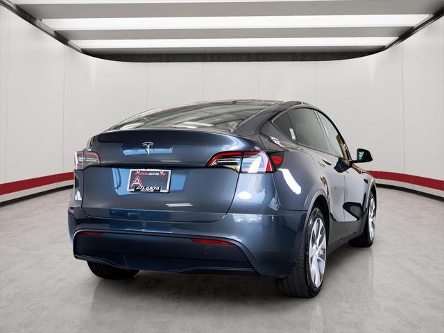 used 2023 Tesla Model Y car, priced at $34,995