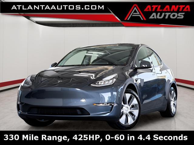 used 2023 Tesla Model Y car, priced at $34,058