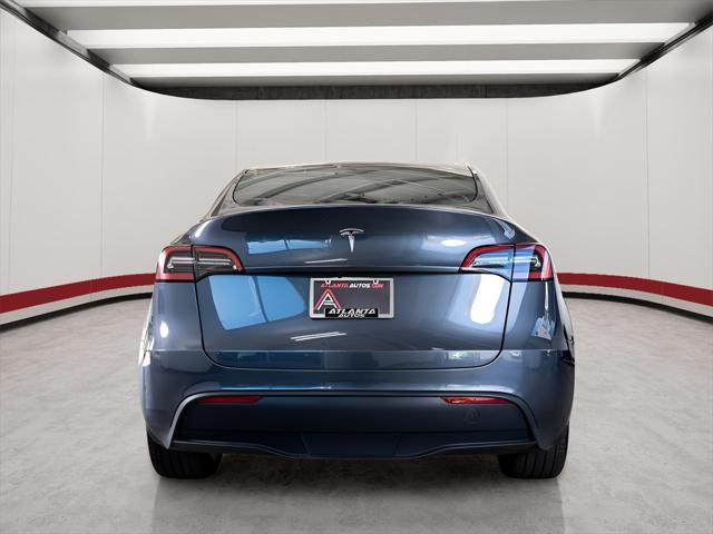 used 2023 Tesla Model Y car, priced at $34,995