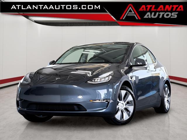 used 2023 Tesla Model Y car, priced at $34,995