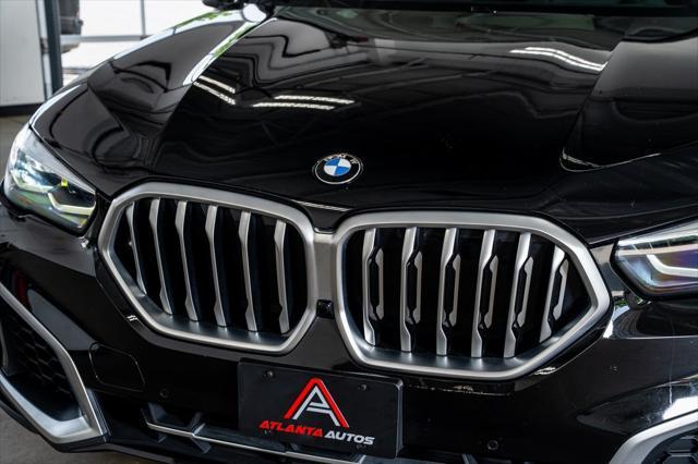 used 2022 BMW X6 car, priced at $52,999