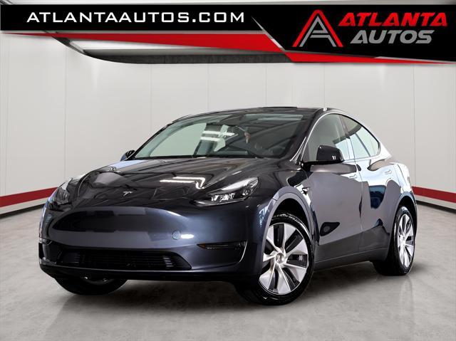 used 2024 Tesla Model Y car, priced at $41,995