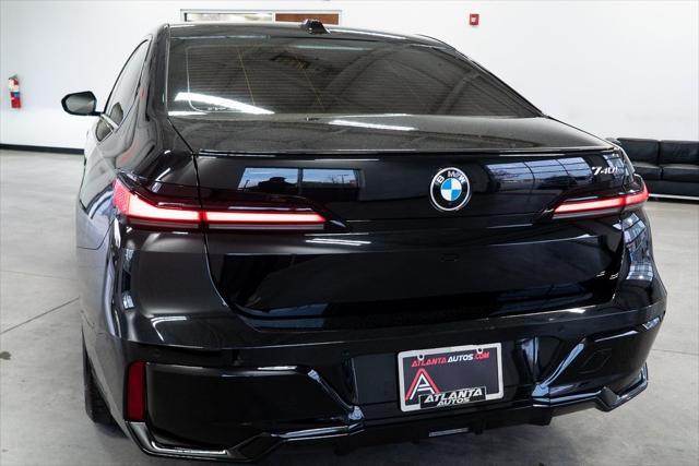 used 2023 BMW 740 car, priced at $74,999