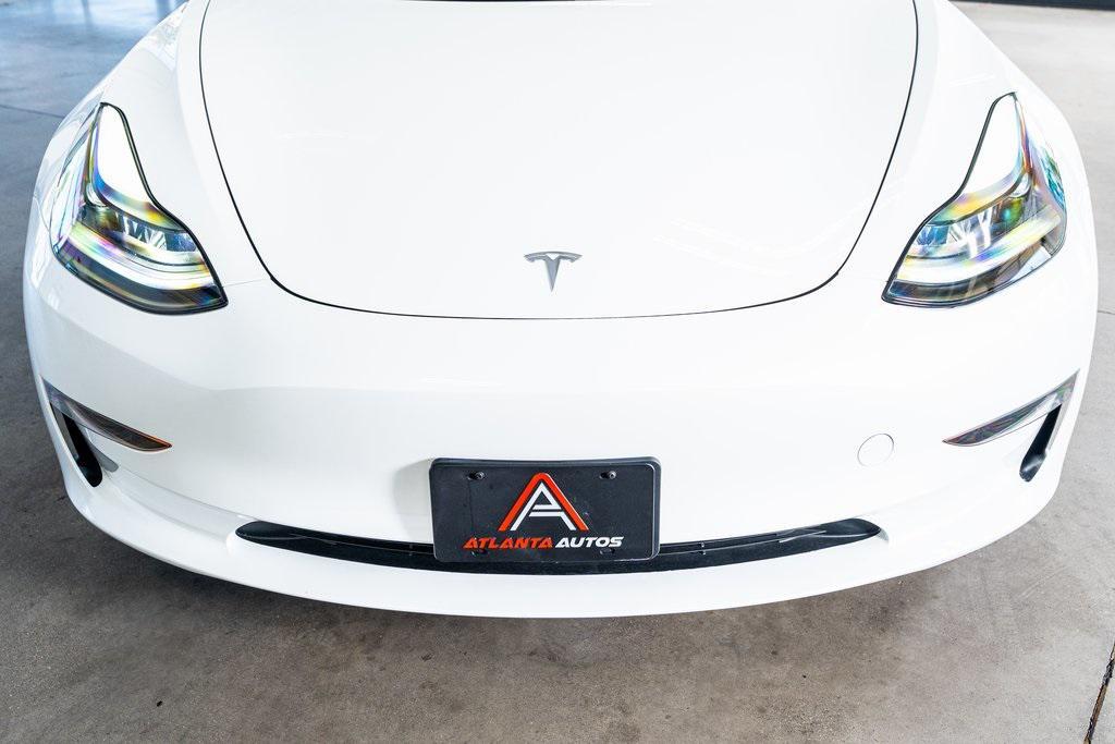 used 2023 Tesla Model 3 car, priced at $25,999