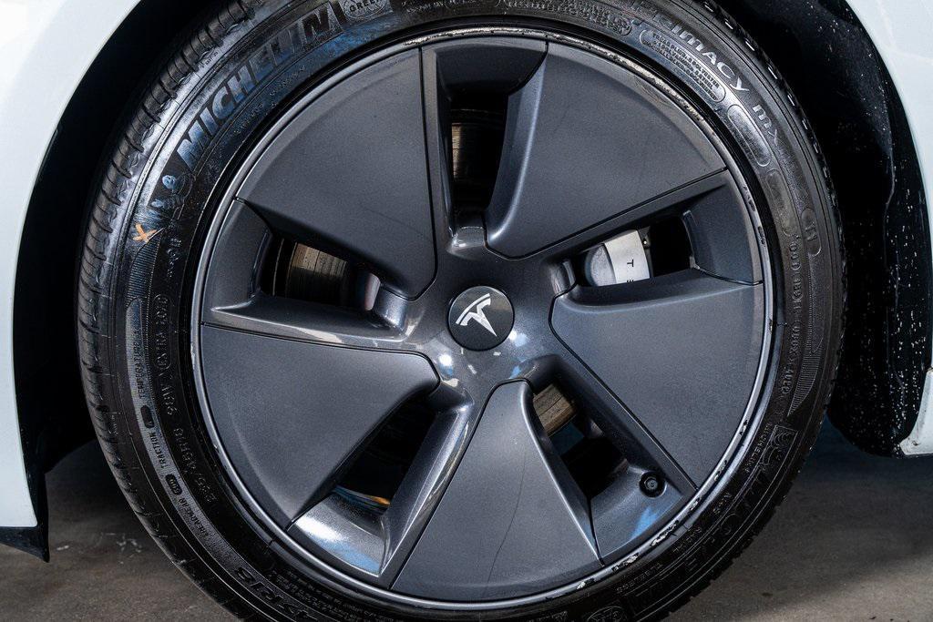 used 2023 Tesla Model 3 car, priced at $25,999