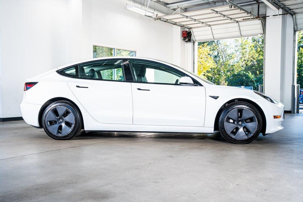 used 2023 Tesla Model 3 car, priced at $25,999