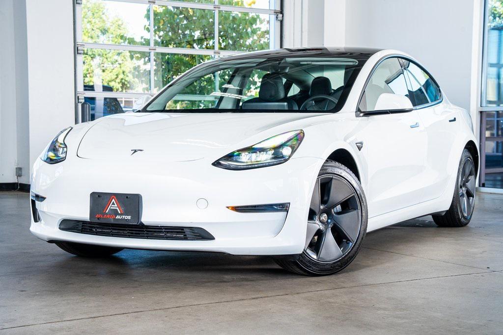 used 2023 Tesla Model 3 car, priced at $25,999