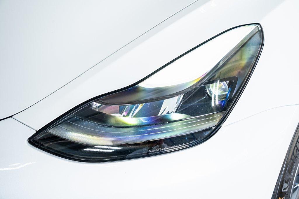 used 2023 Tesla Model 3 car, priced at $25,999
